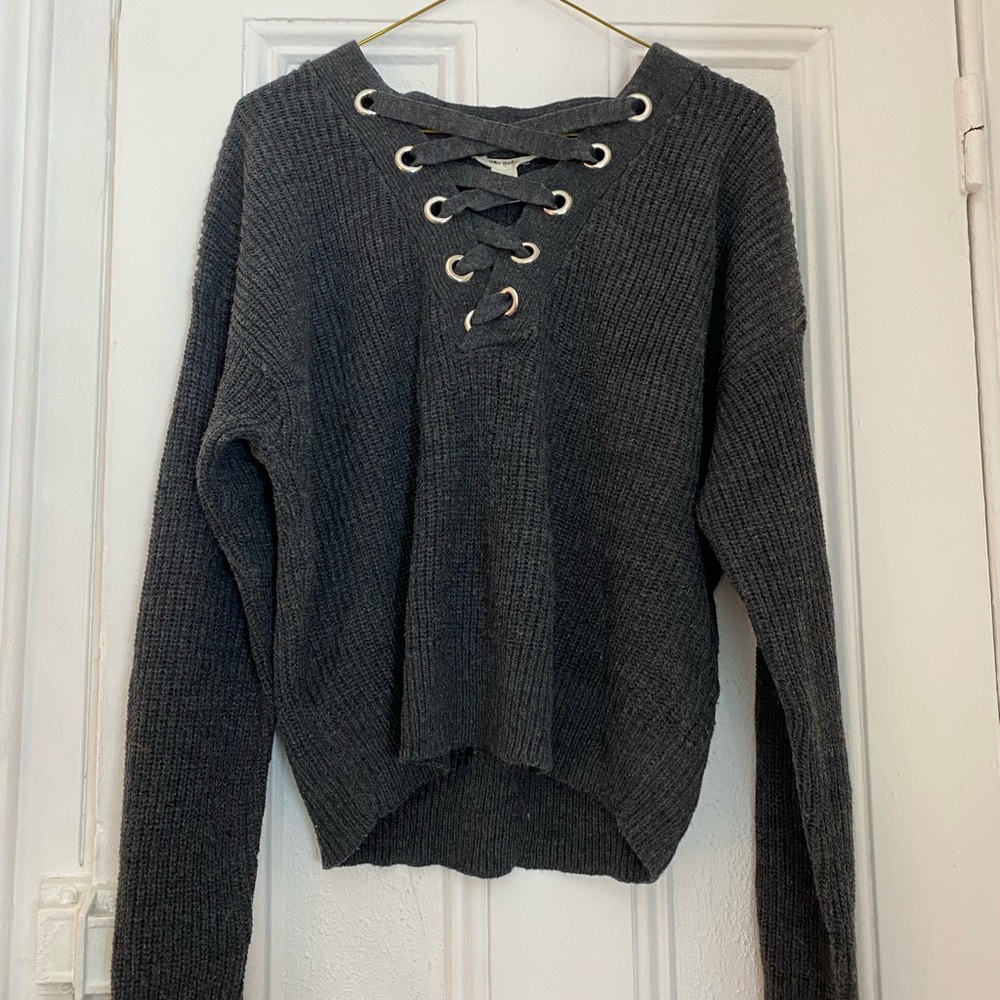 Dark gray sweater with lace up detailing